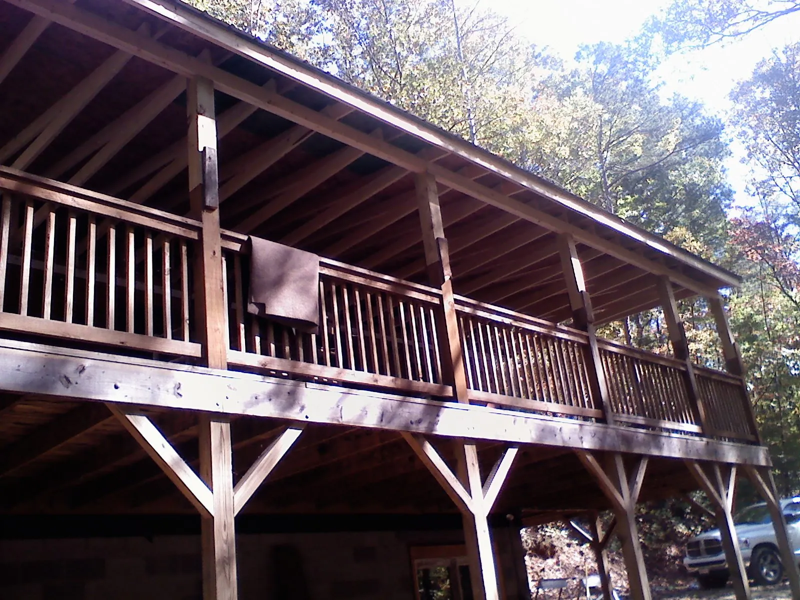 Timber framing under a new elevated porch and deck — Roof Leak Repair in Pryor by Roofing Brothers